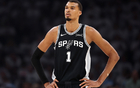 NBA官方对文班亚马进行口头警告，因在关键比赛后拒绝接受采访，成功避免罚款引发热议